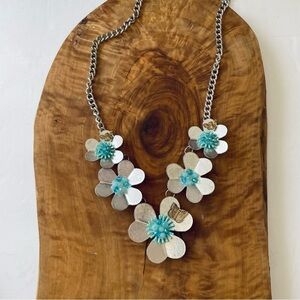 Statement necklace with silver flowers, gold butterflies bumblebee green beads